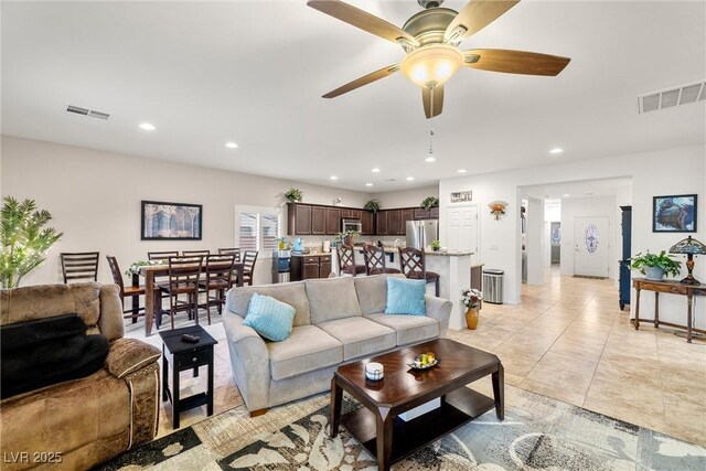 4459 Lavender, Pahrump, NV 89061 - living room featuring ceiling fan and light tile patterned flooring