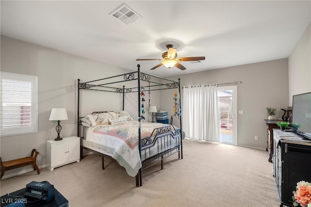 4459 Lavender, Pahrump, NV 89061 - carpeted bedroom with access to exterior and ceiling fan