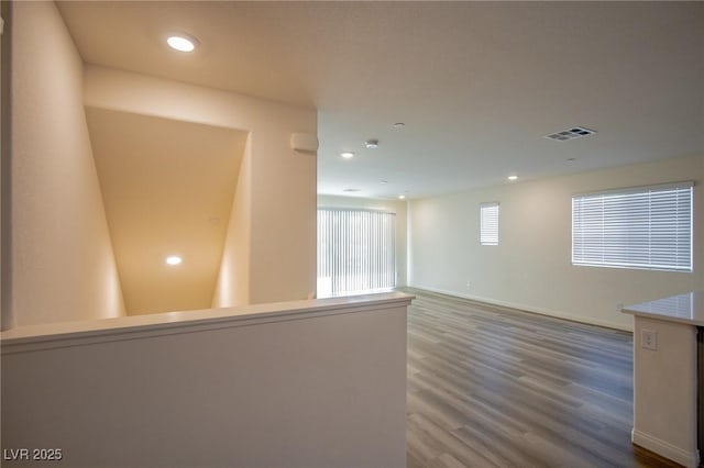 empty room featuring hardwood / wood-style floors