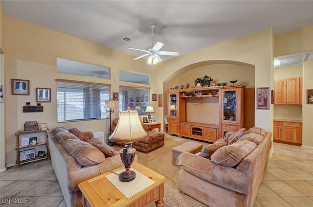 living room with light tile patterned flooring and ceiling fan