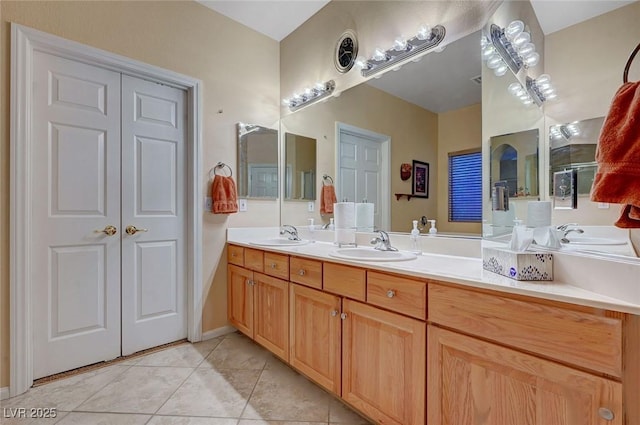 bathroom featuring vanity and tile patterned flooring