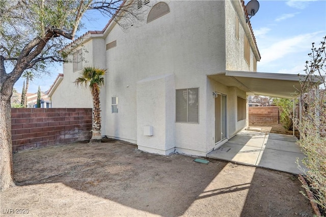 rear view of property with a patio area