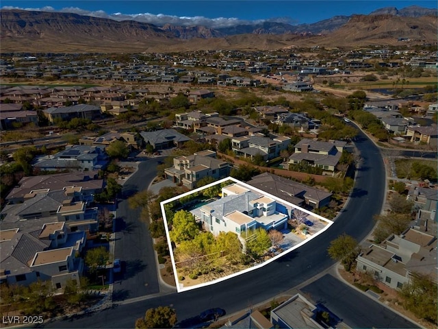 drone / aerial view featuring a mountain view