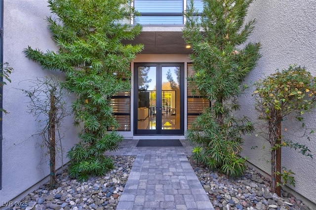 property entrance featuring french doors