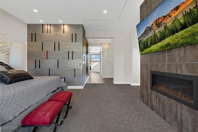 carpeted bedroom with a fireplace