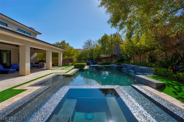 view of swimming pool with a patio, ceiling fan, and an in ground hot tub