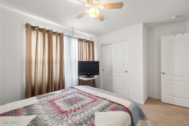 3924 E Garfield Dr, Pahrump, NV 89061 - bedroom with a closet, baseboards, carpet, and a ceiling fan