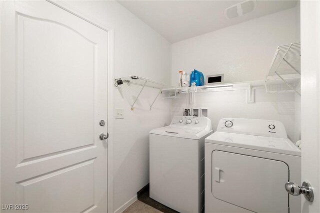 3924 E Garfield Dr, Pahrump, NV 89061 - washroom featuring visible vents, separate washer and dryer, and laundry area