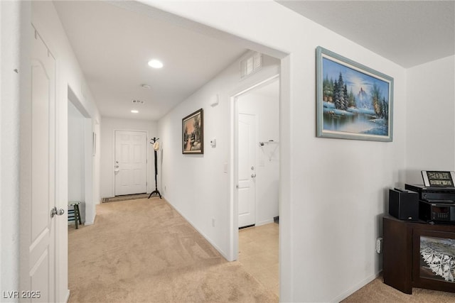 3924 E Garfield Dr, Pahrump, NV 89061 - hallway with recessed lighting, baseboards, light carpet, and visible vents