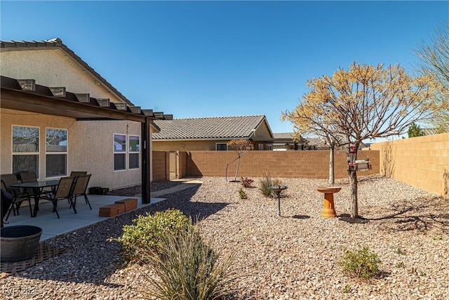 3924 E Garfield Dr, Pahrump, NV 89061 - view of yard with a fenced backyard and a patio