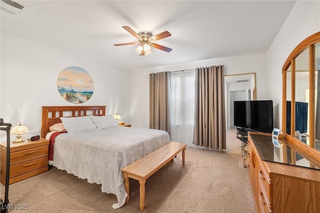3924 E Garfield Dr, Pahrump, NV 89061 - bedroom with a ceiling fan, light colored carpet, and visible vents