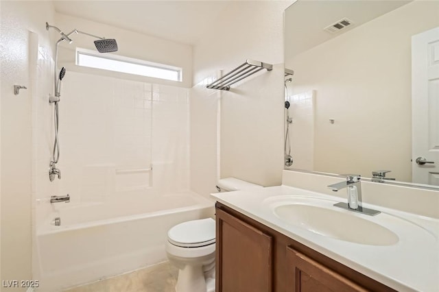 full bathroom with vanity, tub / shower combination, and toilet