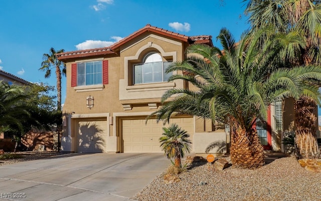 mediterranean / spanish-style house featuring a garage