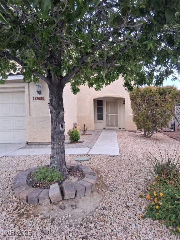 5830 Springmist St, North Las Vegas, NV 89031 - view of front of property with stucco siding