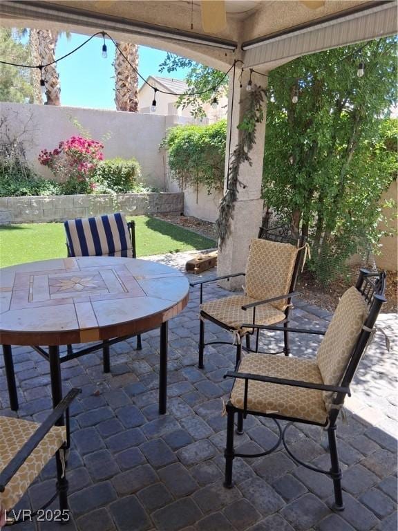 5830 Springmist St, North Las Vegas, NV 89031 - view of patio / terrace with outdoor dining space