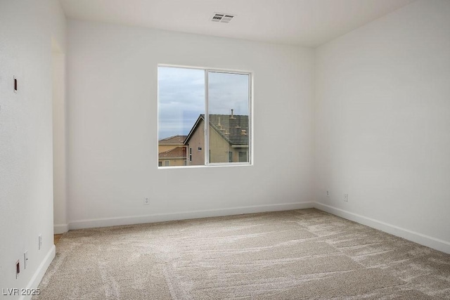 view of carpeted spare room