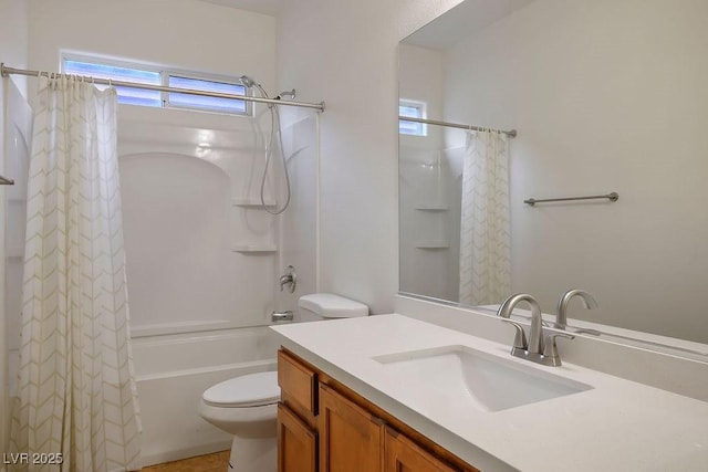 full bathroom with vanity, a wealth of natural light, shower / bath combination with curtain, and toilet