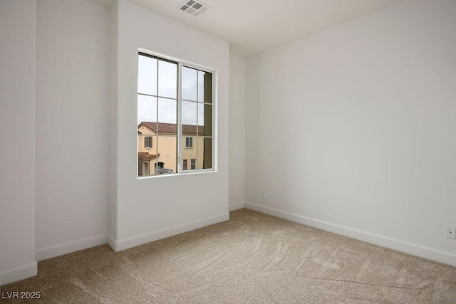 empty room with carpet flooring