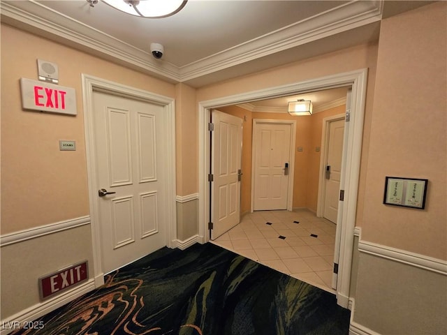 135 E Harmon Ave Unit 2120, Las Vegas, NV 89109 - corridor featuring baseboards, ornamental molding, and light tile patterned flooring