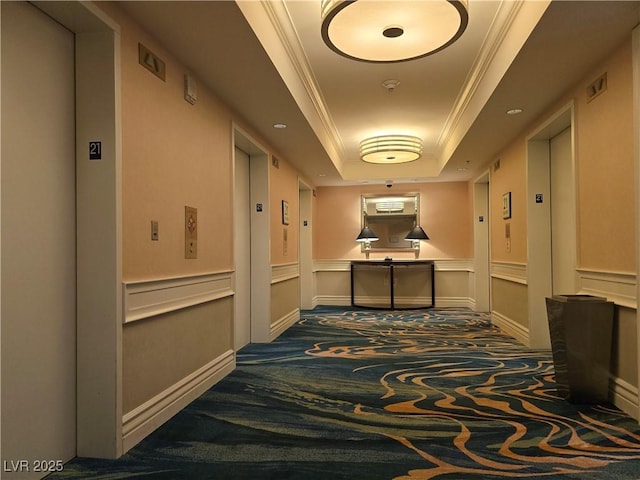 135 E Harmon Ave Unit 2120, Las Vegas, NV 89109 - corridor with carpet flooring, elevator, ornamental molding, and a raised ceiling