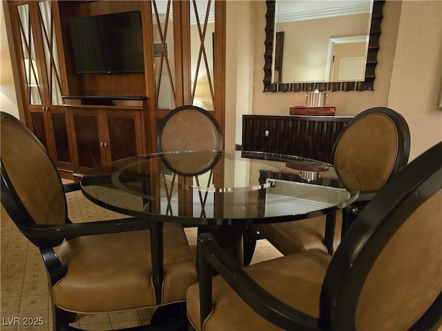 135 E Harmon Ave Unit 2120, Las Vegas, NV 89109 - dining area featuring ornamental molding