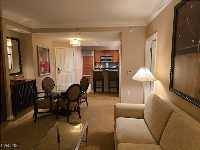 135 E Harmon Ave Unit 2120, Las Vegas, NV 89109 - living area featuring crown molding, baseboards, and light carpet