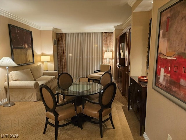 135 E Harmon Ave Unit 2120, Las Vegas, NV 89109 - dining space with crown molding, baseboards, and visible vents
