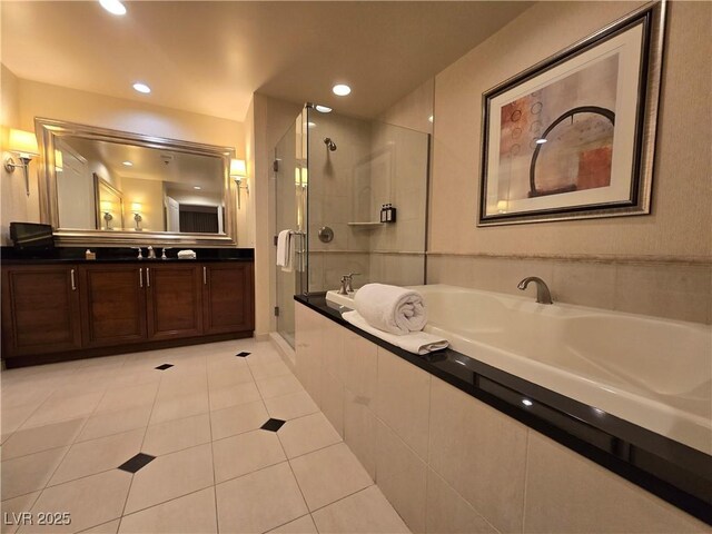 135 E Harmon Ave Unit 2120, Las Vegas, NV 89109 - full bath featuring tile patterned flooring, vanity, tiled shower, recessed lighting, and a bath