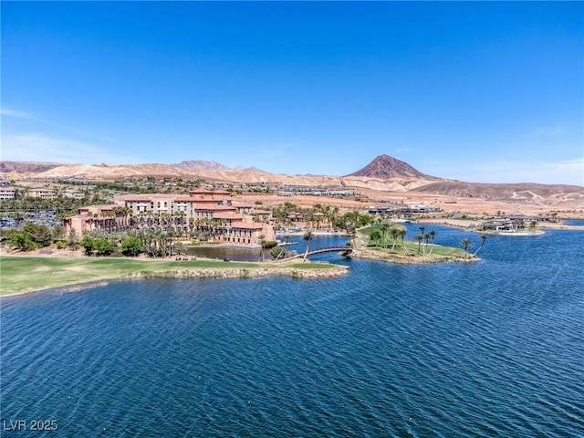 bird's eye view with a water and mountain view