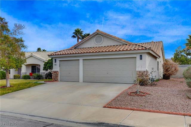 view of front of property with a garage