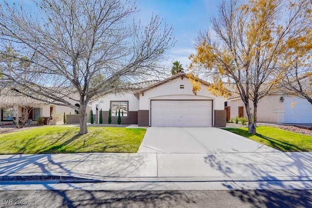 view of front of property with a garage and a front lawn