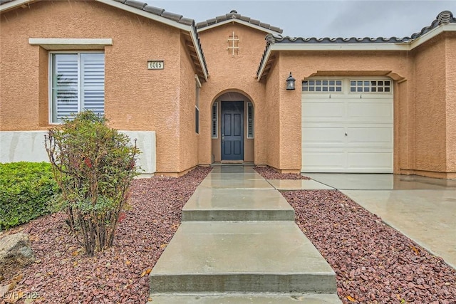 entrance to property with a garage