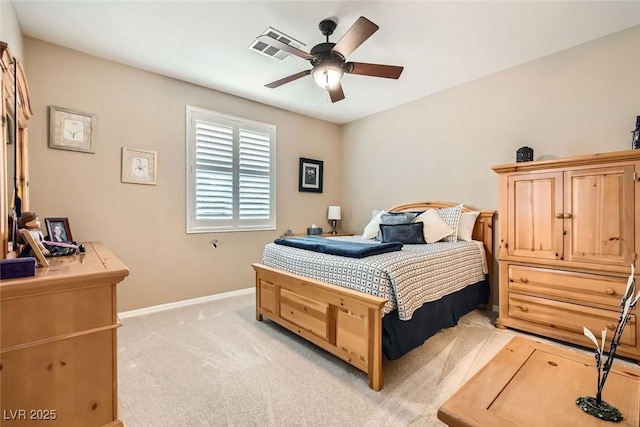 bedroom featuring light carpet and ceiling fan