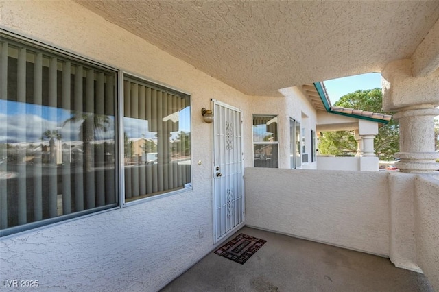 doorway to property with a balcony