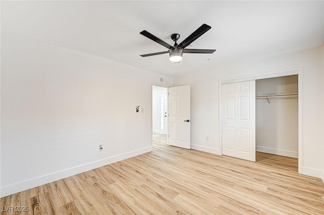 unfurnished bedroom featuring a closet, ceiling fan, and light wood-type flooring