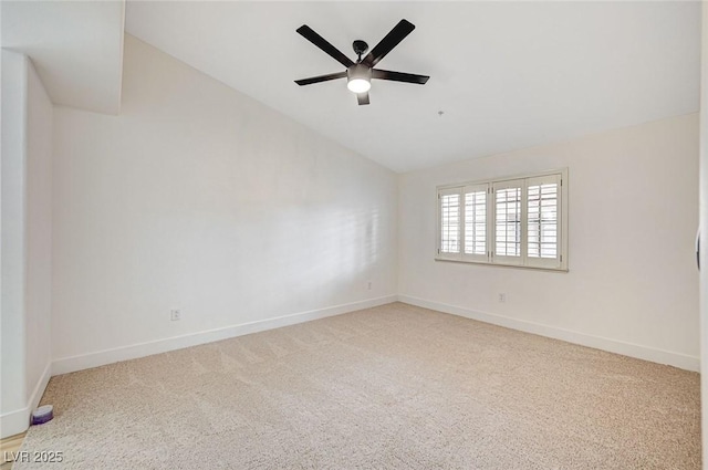 unfurnished room featuring lofted ceiling, carpet flooring, and ceiling fan