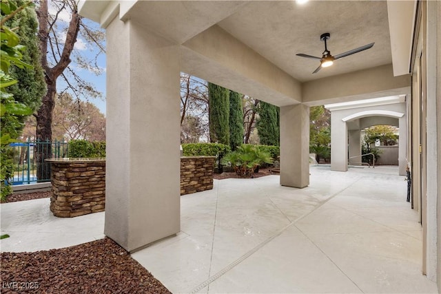 view of patio with ceiling fan