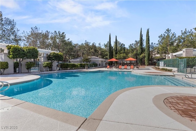 view of pool featuring a patio area