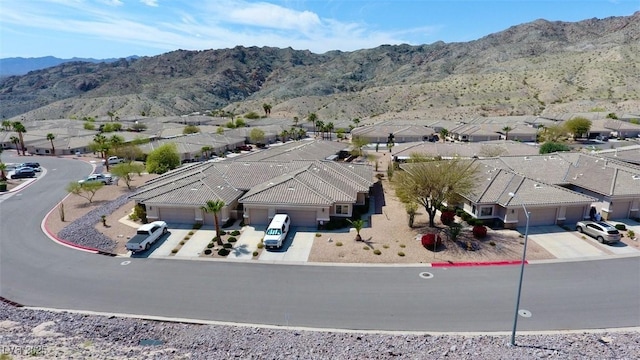 drone / aerial view featuring a mountain view