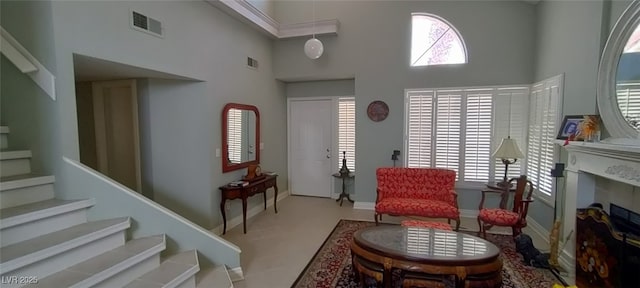 sitting room with a high ceiling