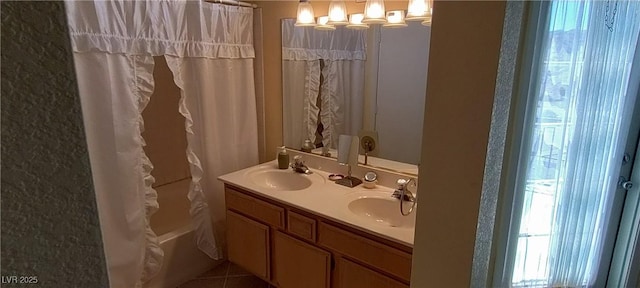 bathroom with vanity, tile patterned flooring, and shower / bath combo