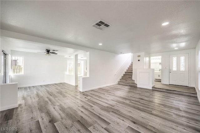 entrance foyer featuring ceiling fan and light hardwood / wood-style flooring