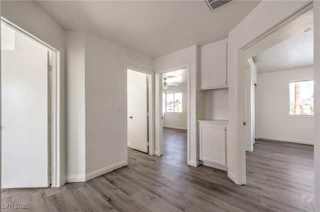 hall featuring light hardwood / wood-style floors