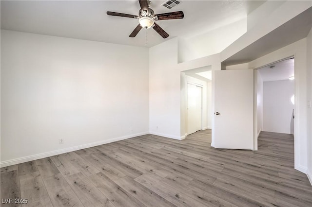 unfurnished room with ceiling fan and light hardwood / wood-style floors