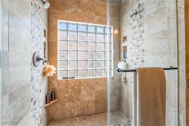 bathroom with plenty of natural light and an enclosed shower