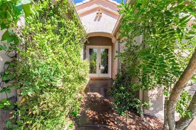 entrance to property featuring french doors