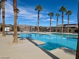 2379 Albury Ave, North Las Vegas, NV 89086 - community pool with a patio area