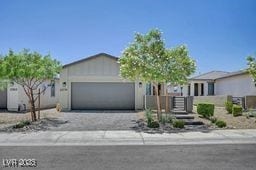 2379 Albury Ave, North Las Vegas, NV 89086 - ranch-style house with a garage and driveway