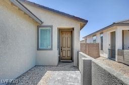 2379 Albury Ave, North Las Vegas, NV 89086 - view of exterior entry featuring stucco siding