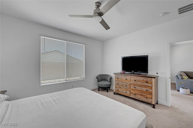 2379 Albury Ave, North Las Vegas, NV 89086 - bedroom with light colored carpet and ceiling fan